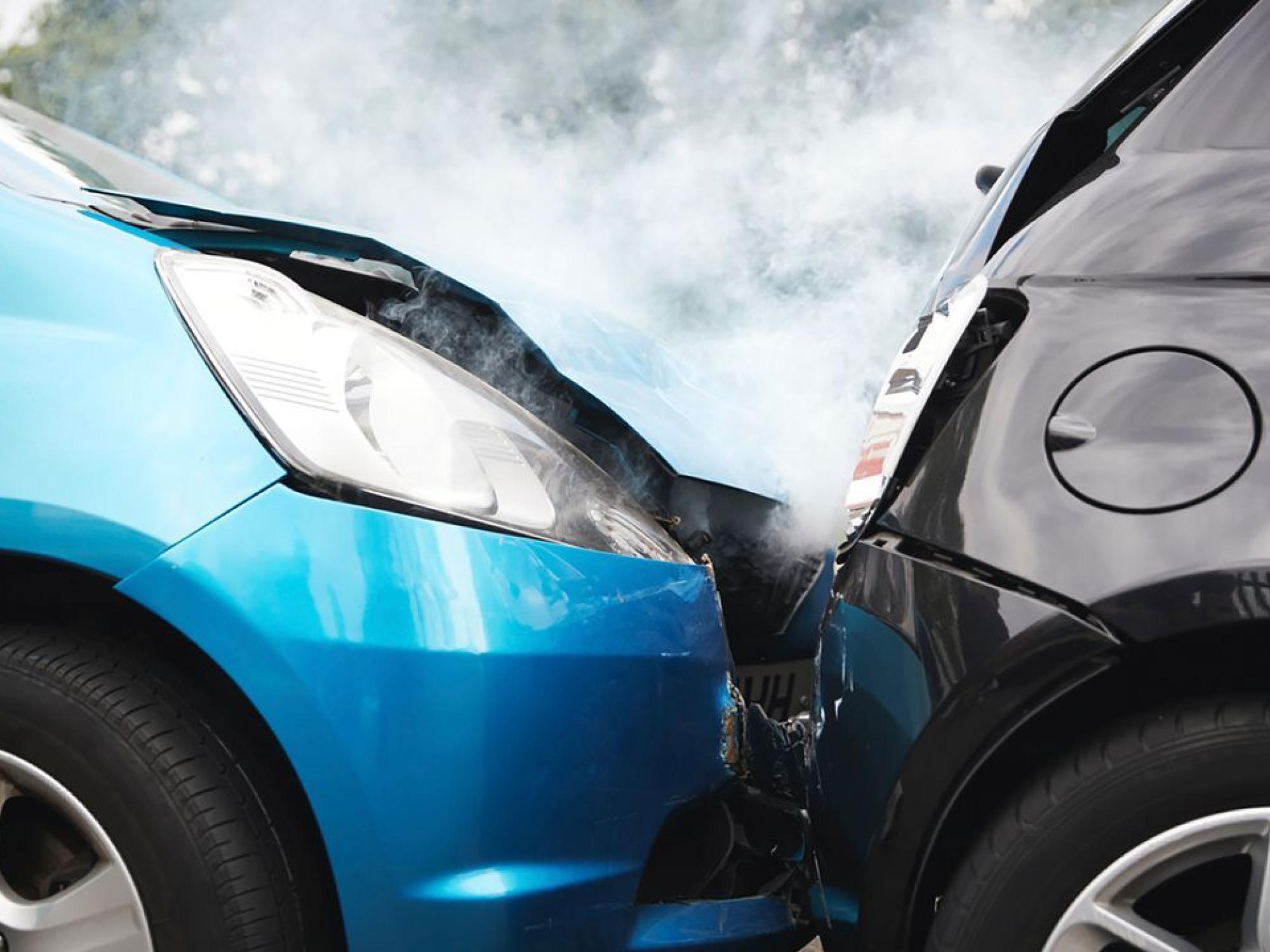 two cars crashed in a headon collision
